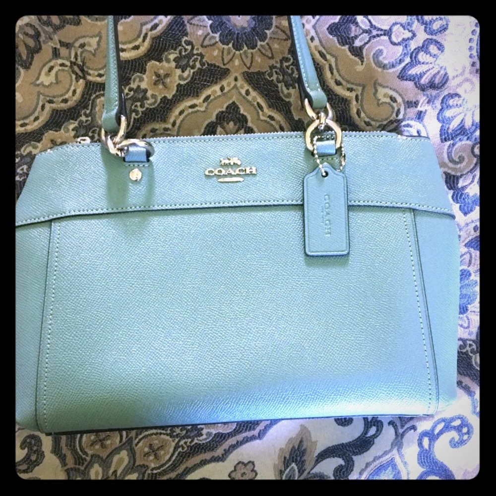 Coach mini Brooke with matching wallet.